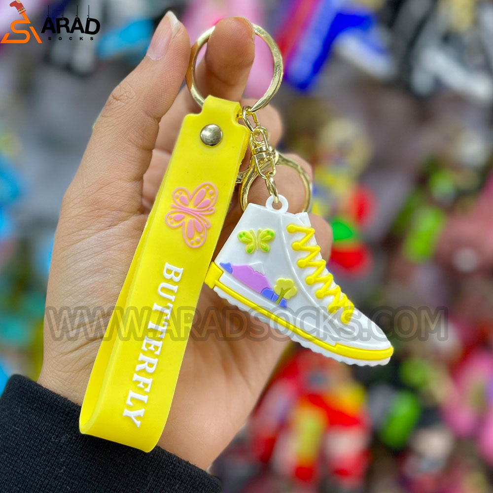 keyholder5 جاکلیدی سیلیکونی طرح کتانی زرد - Image 1