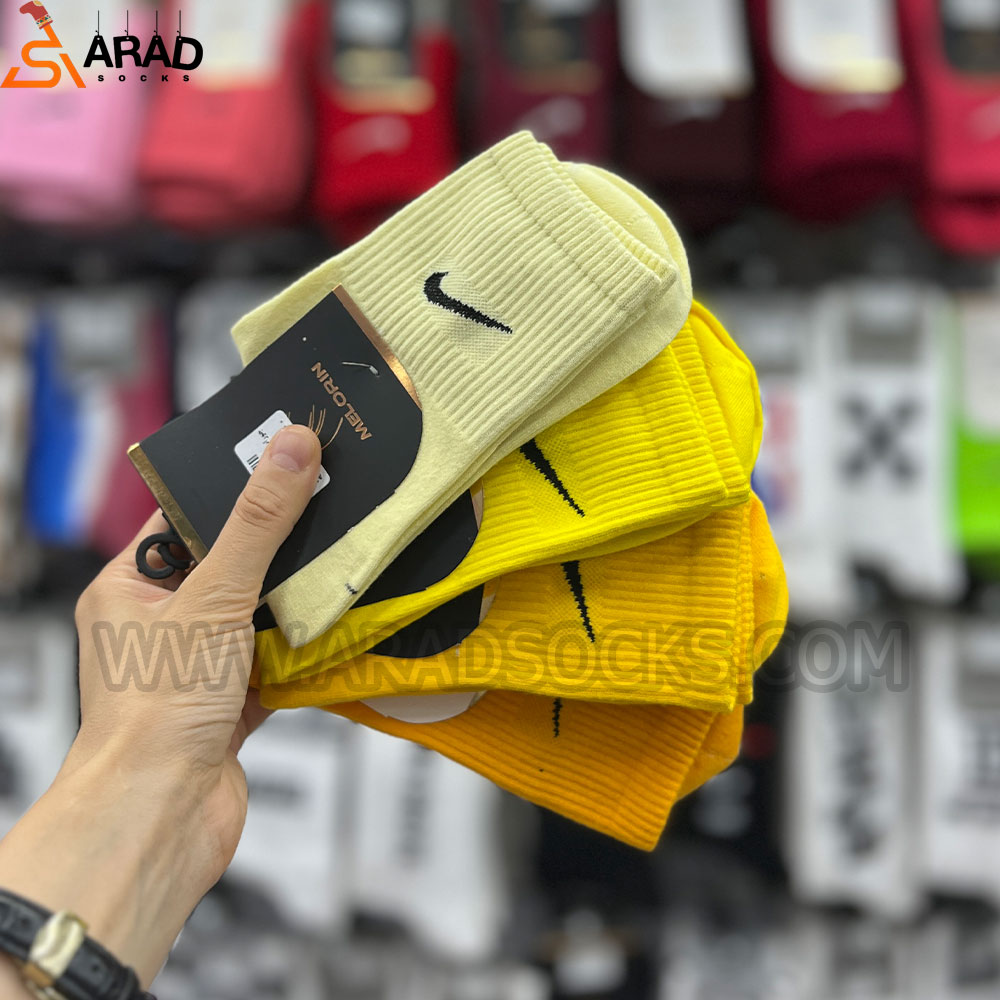 جوراب ساقدار اسپرت نایکی تناژ زرد جوراب ساقدار اسپرت نایکی تناژ زرد