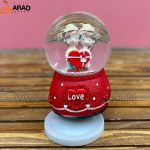 گوی موزیکال متوسط طرح دختر و پسر قرمز و قلب