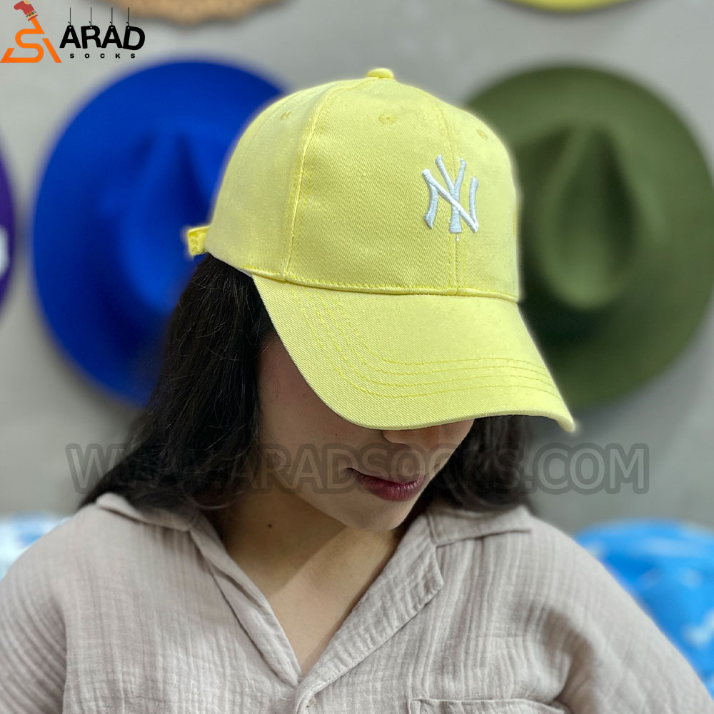 کلاه بیسبالی کتان طرح نیویورک رنگ زرد کلاه بیسبالی کتان طرح نیویورک رنگ زرد