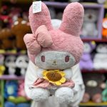 عروسک ملودی گل به دست